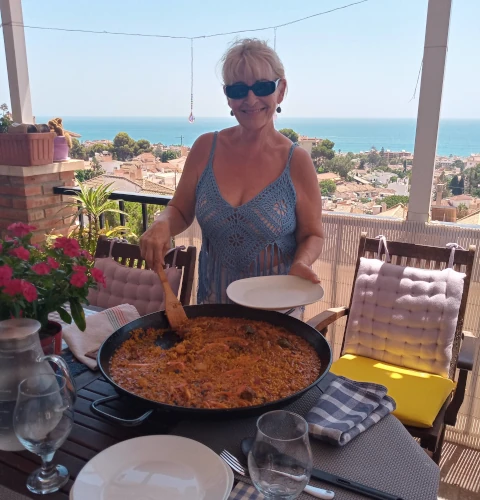 Paloma con paella